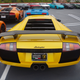 Illustration for article titled Supercars Took Over A Garage To Welcome The $1.9 Million Lamborghini Centenario